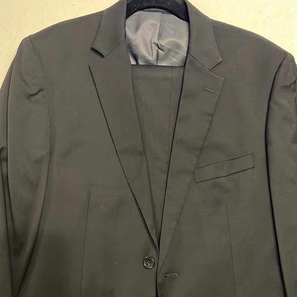 Selling a Kenneth Cole suit.